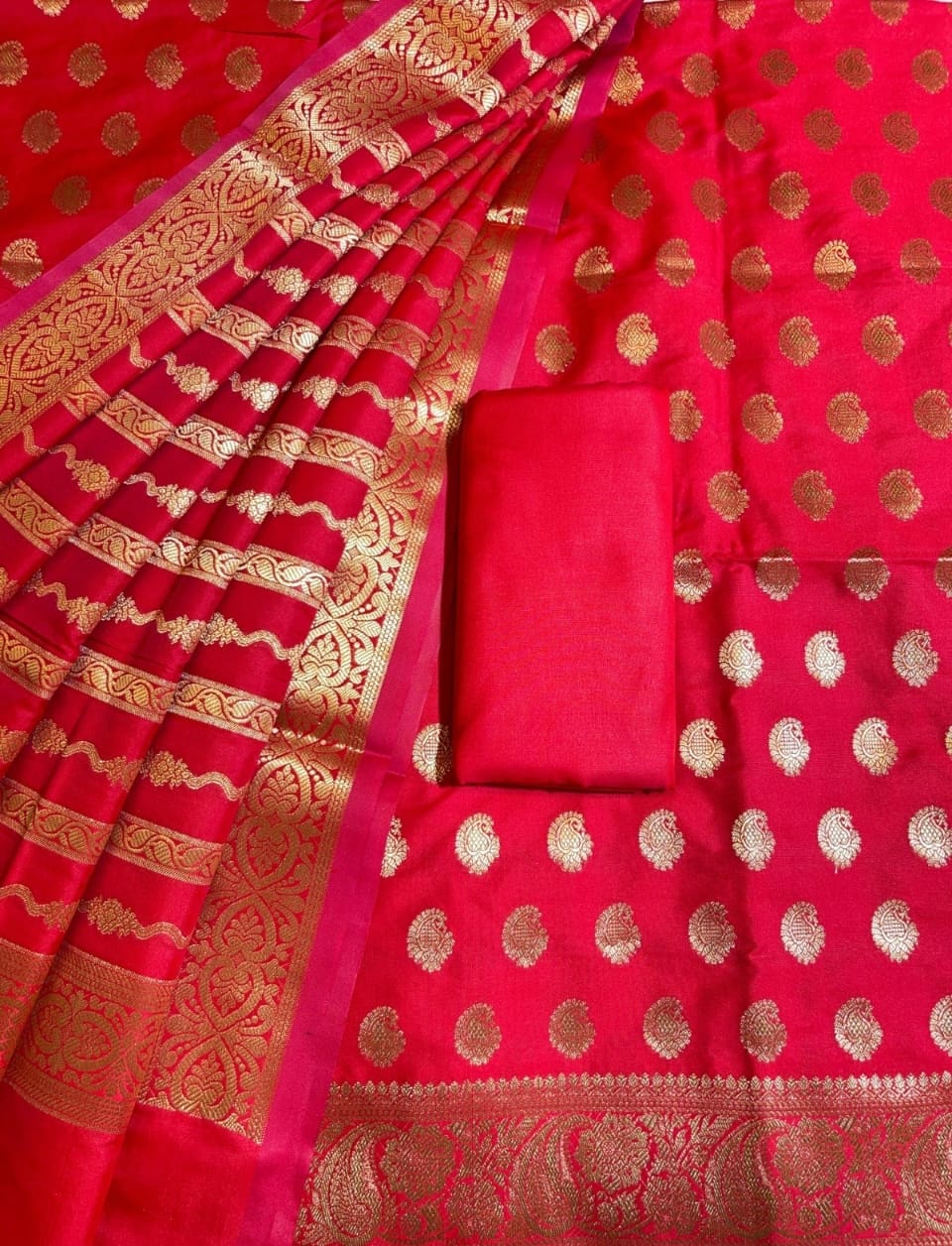 Banarasi Soft Silk Unstitched Suit.