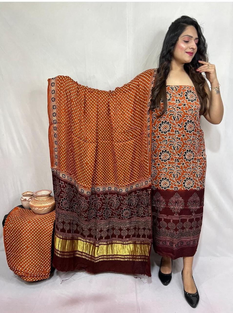 Pure Modal Silk Ajrakh Hend Block Zari Pallu Weaved 3pc Unstitched Suit .