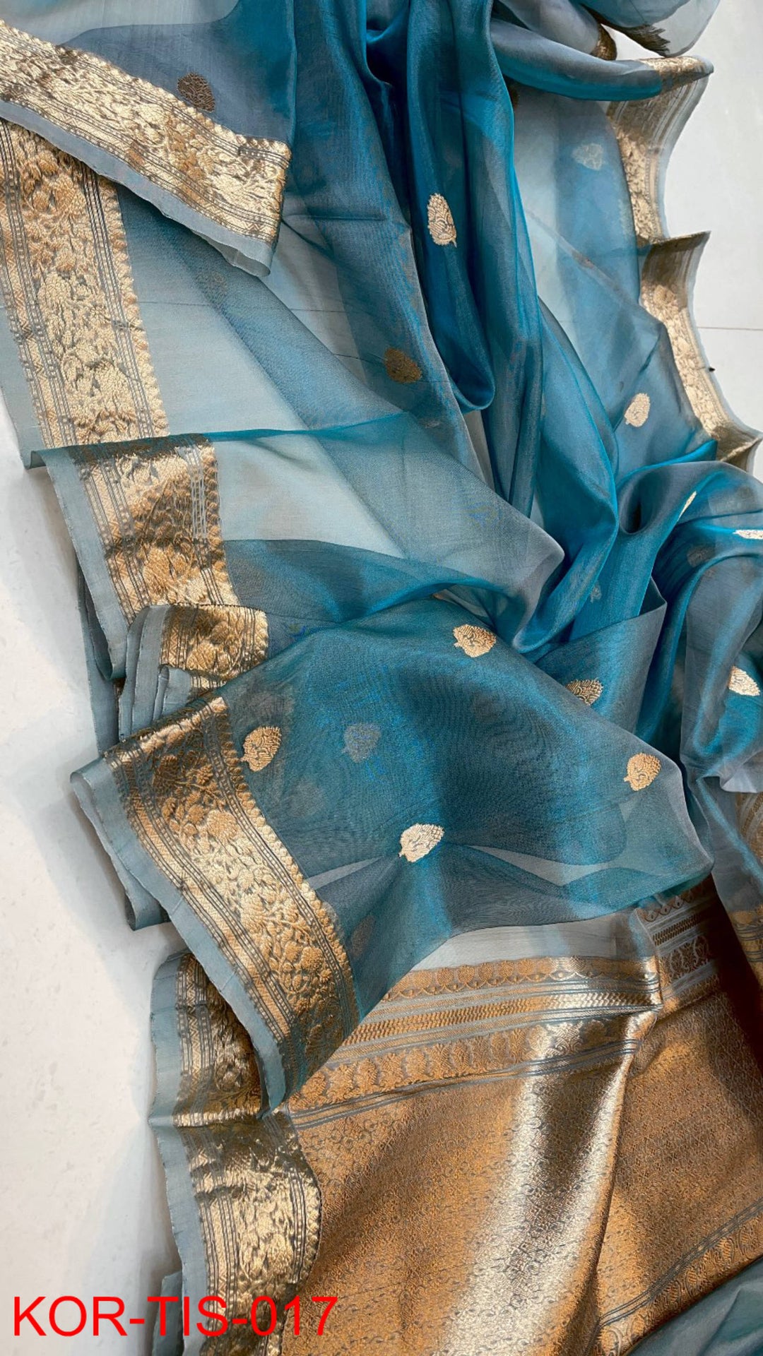 Pure Kora Tissue Silk Hanloom Zari Work Saree.