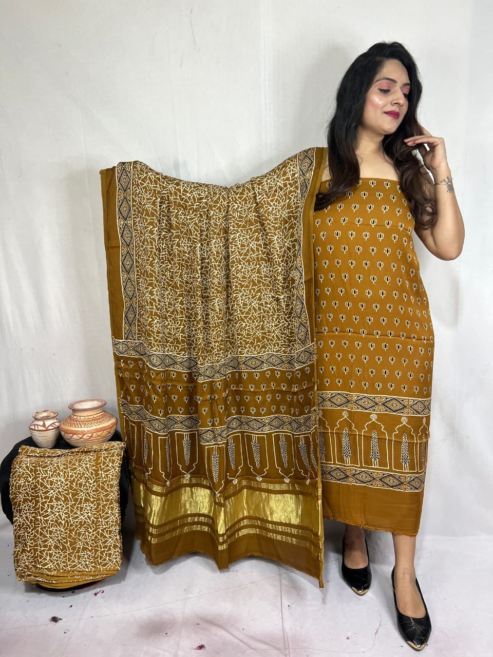 Pure Modal Silk Zari Pallu Weaved 3pc Unstitched Suit .