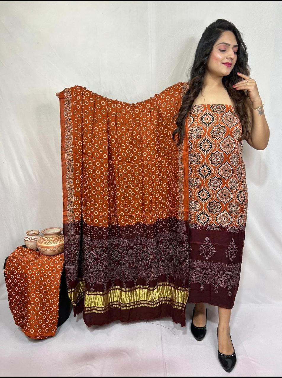 Pure Modal Silk Ajrakh Hend Block Zari Pallu Weaved 3pc Unstitched Suit .