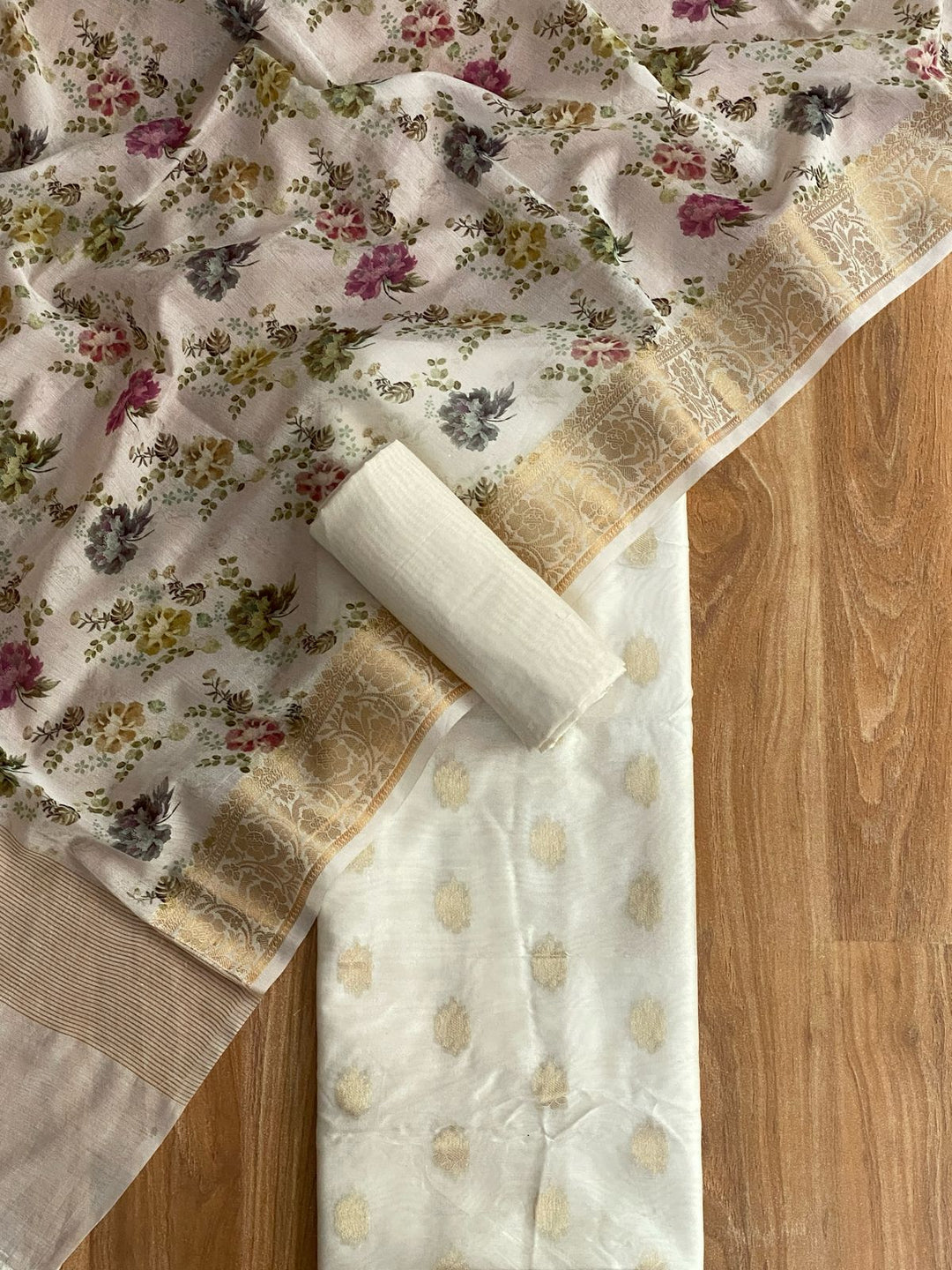 Pure Banarasi Chanderi Silk zari Weaved Unstitcehd Suit With Chanderi Silk Flower Print Dupatta.