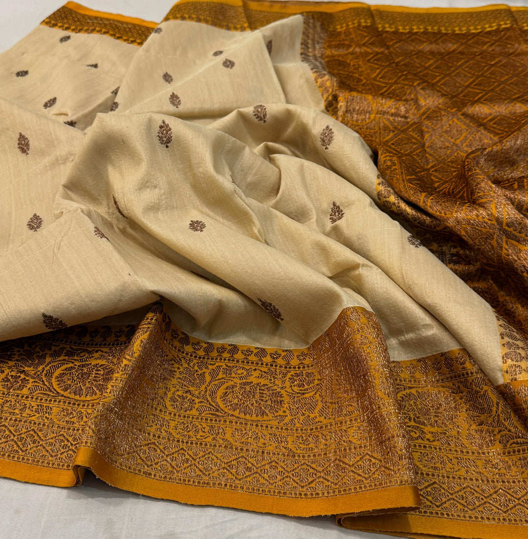 HandloomPure Banarasi Tussar Silk Saree With Kadhuwa Border Work.