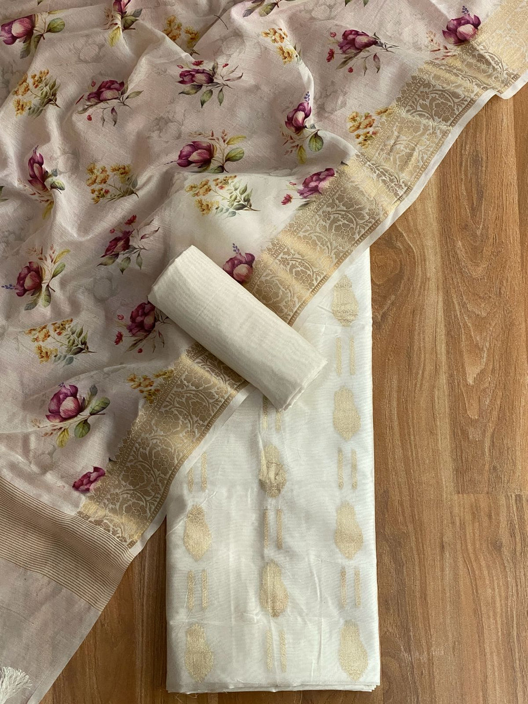 Pure Banarasi Chanderi Silk zari Weaved Unstitcehd Suit With Chanderi Silk Flower Print Dupatta.