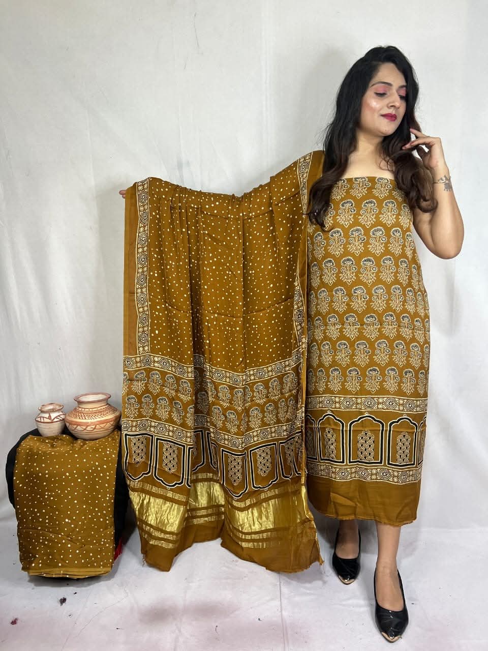 Pure Modal Silk Zari Pallu Weaved 3pc Unstitched Suit .