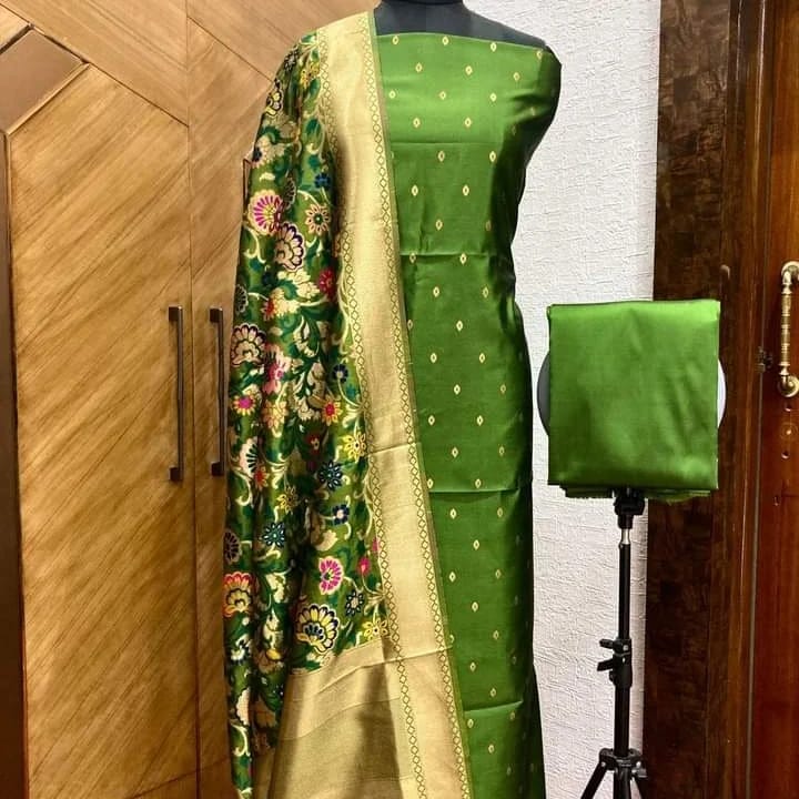 Banarasi katan Silk Zari weaved Suit With Zari and Resham Weaving Dupatta.