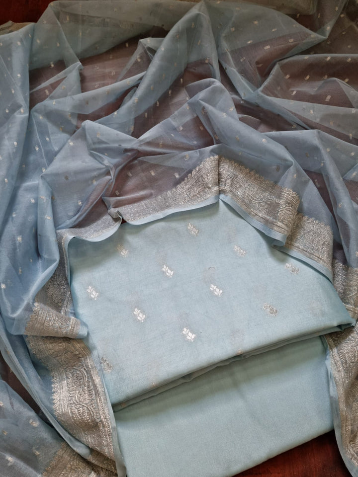 Pure Banarasi Chiniya Silk Unstitched Suit paired With Beautiful Khaddi Chiffon Dupatta | TURQUOISE|