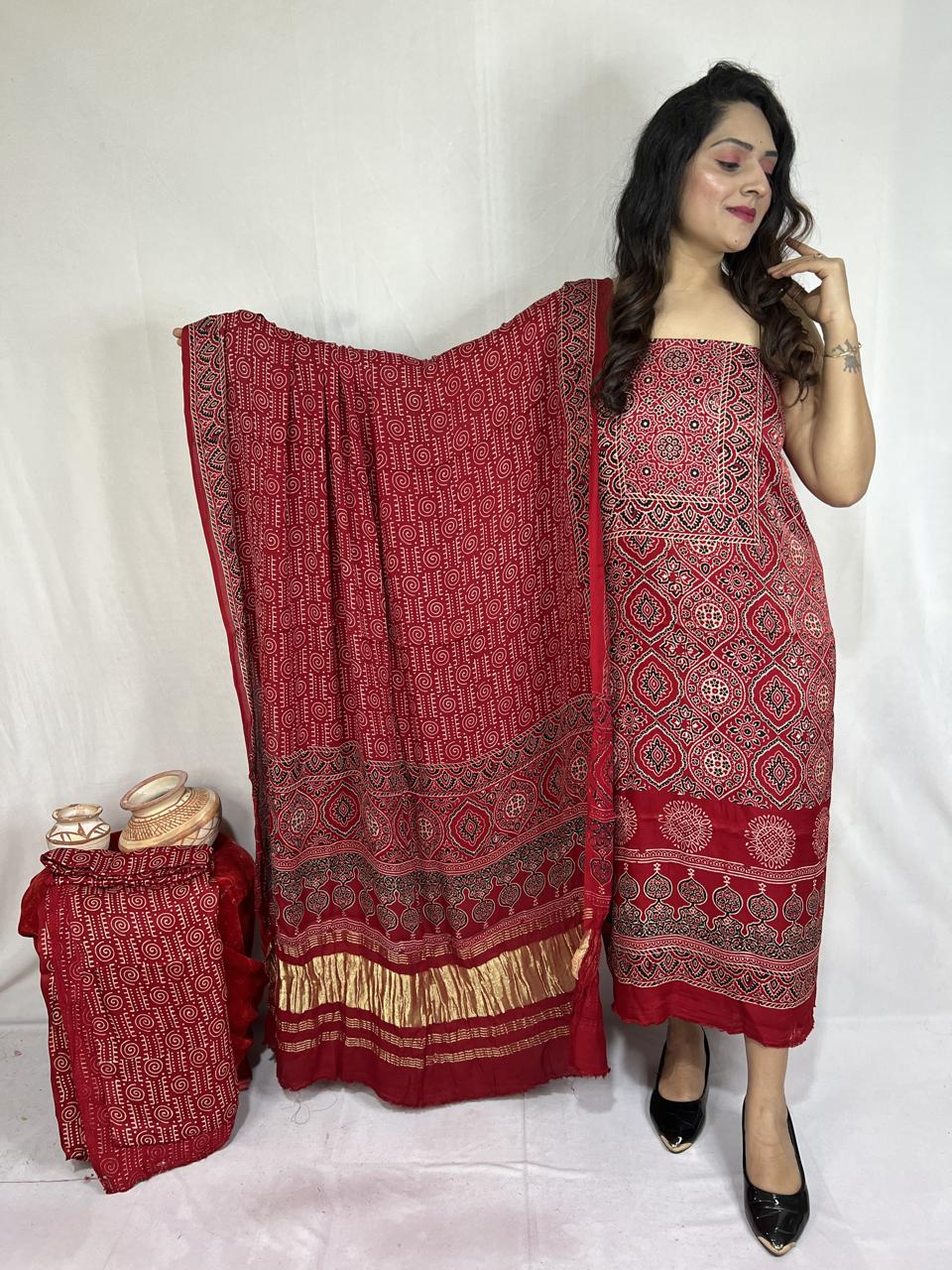 Pure Modal Silk Ajrakh Hend Block Zari Pallu Weaved 3pc Unstitched Suit .