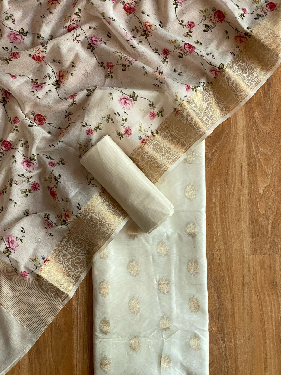 Pure Banarasi Chanderi Silk zari Weaved Unstitcehd Suit With Chanderi Silk Flower Print Dupatta.