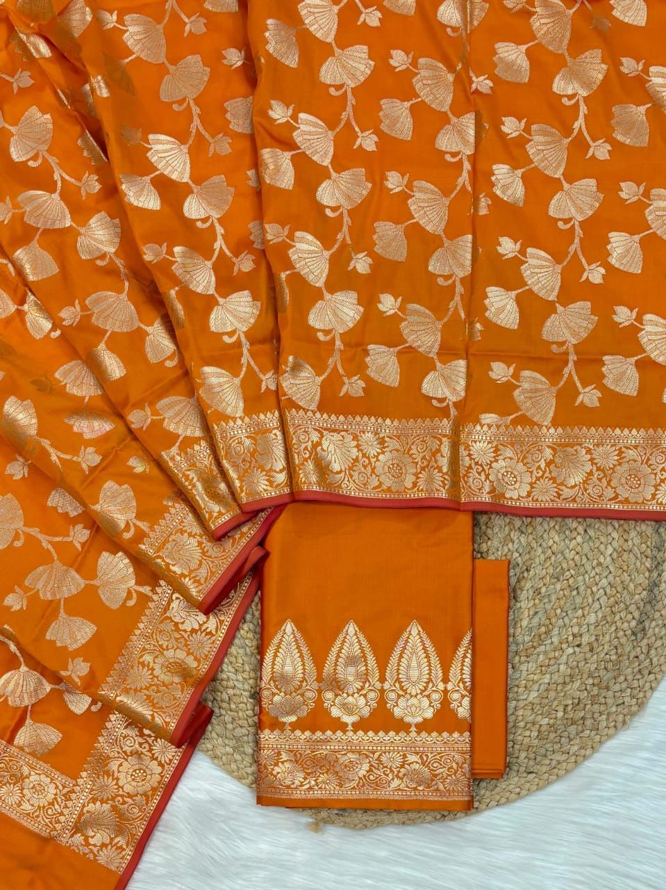 Banarasi Soft Silk Unstitched Suit.
