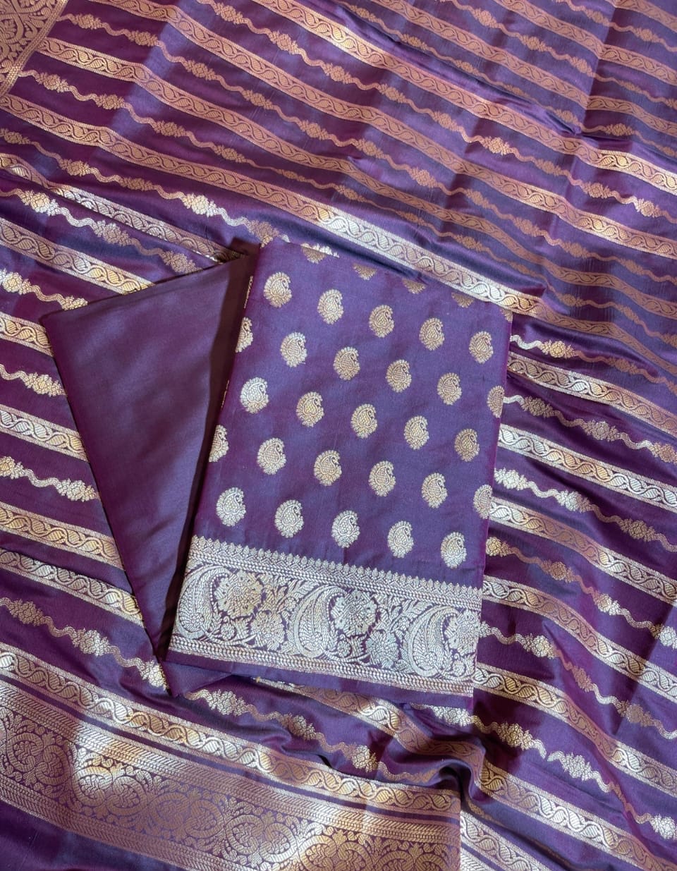 Banarasi Soft Silk Unstitched Suit.