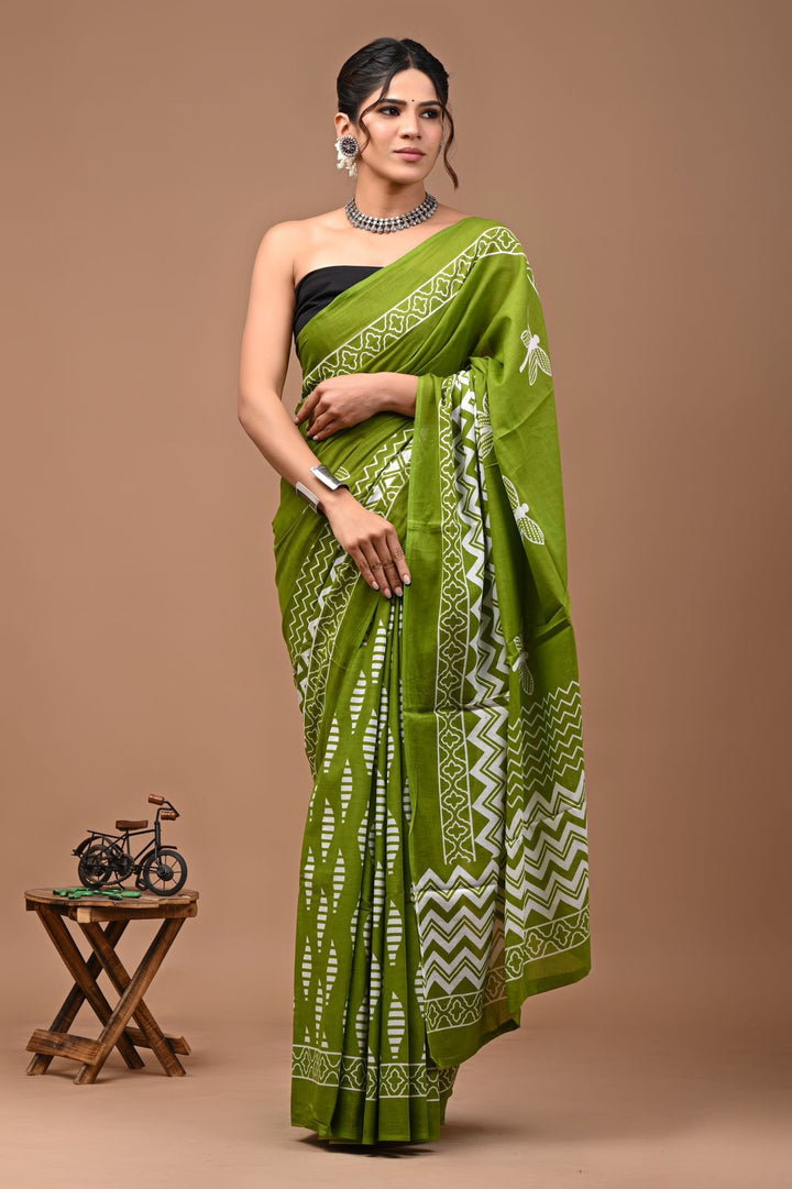 Pure  Mul cotton Hand print saree with Blouse.