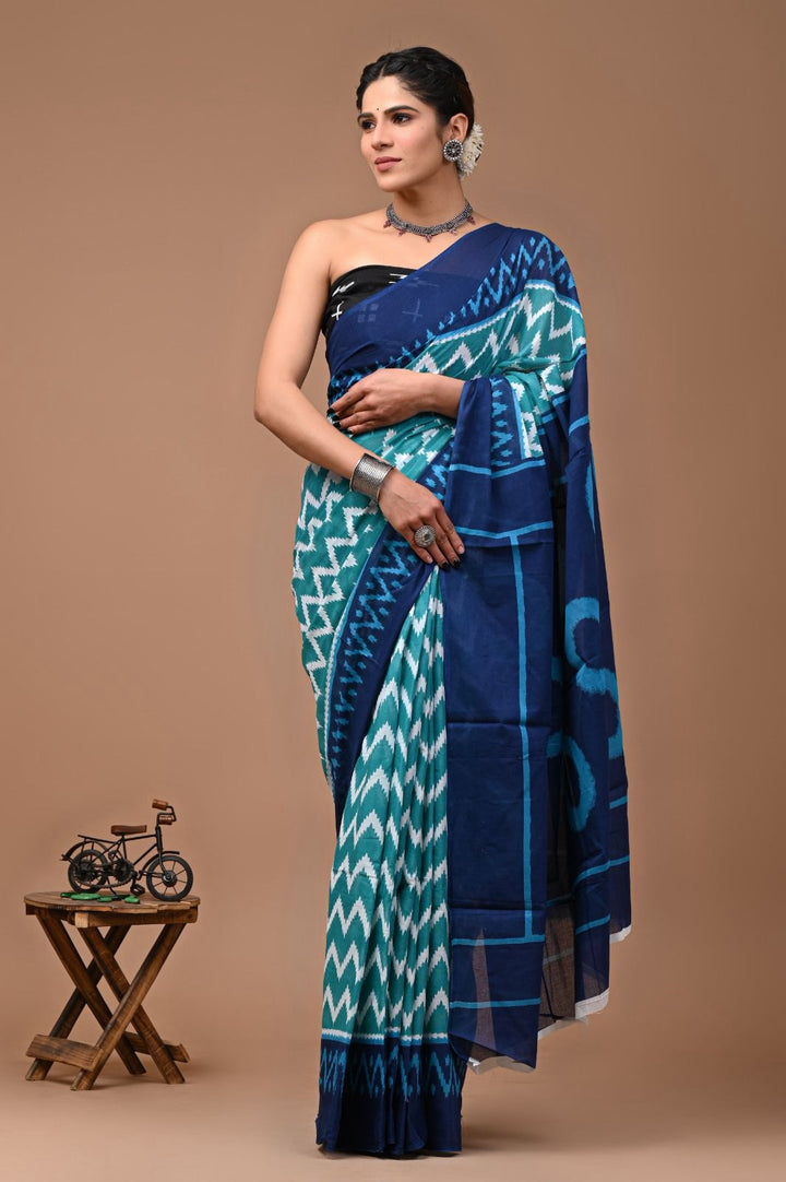 Pure  Mul cotton Hand print saree with Blouse.