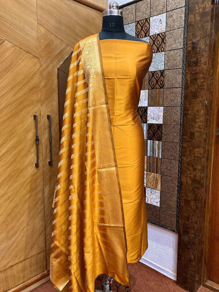 Exclusive Banarasi Soft Silk 3 pc Unstitched Suit .