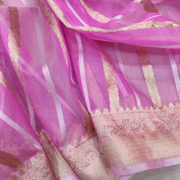 Pure Organza Silk Handwoven Silver And Gold Zari stirp Work Saree.