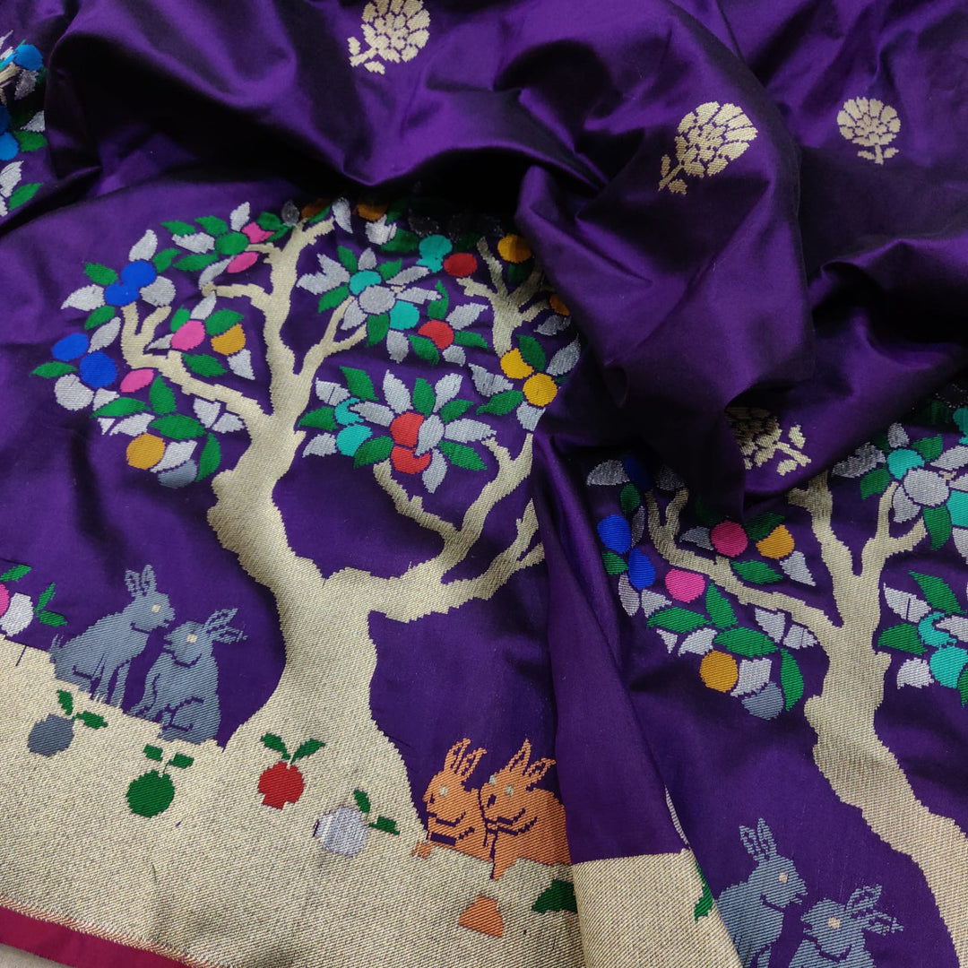 Pure katan Silk Handwoven Golden Zari And Multi color Resham Work Saree.