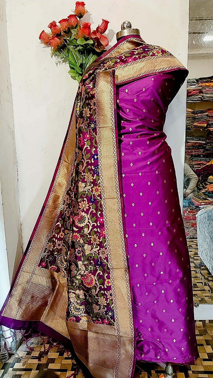 Banarasi katan Silk Zari weaved Suit With Zari and Resham Weaving Dupatta.