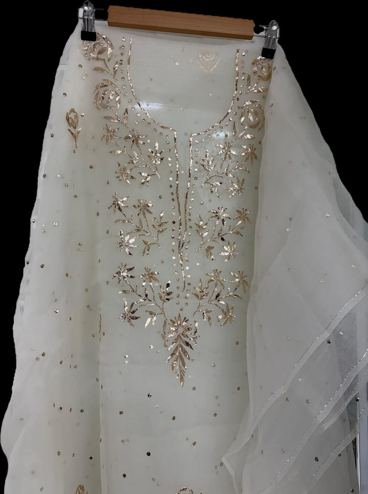 Pure organza tissue unstitched Kurta with dupatta Embellished with Badla Pitta Mukaish work.