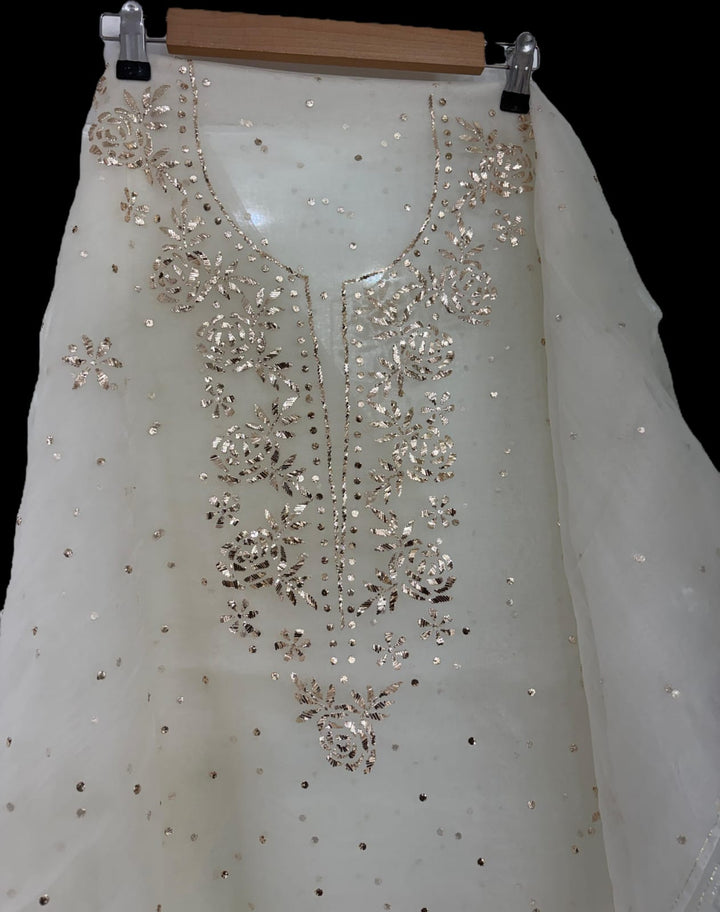 Pure organza tissue unstitched Kurta with dupatta Embellished with Badla Pitta Mukaish work.