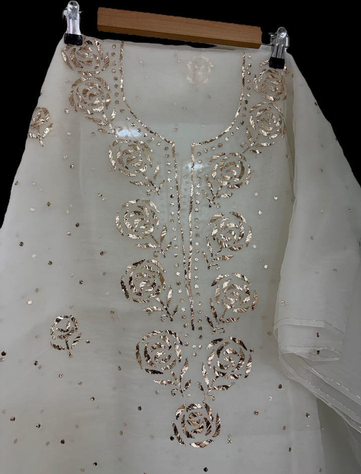 Pure organza tissue unstitched Kurta with dupatta Embellished with Badla Pitta Mukaish work.