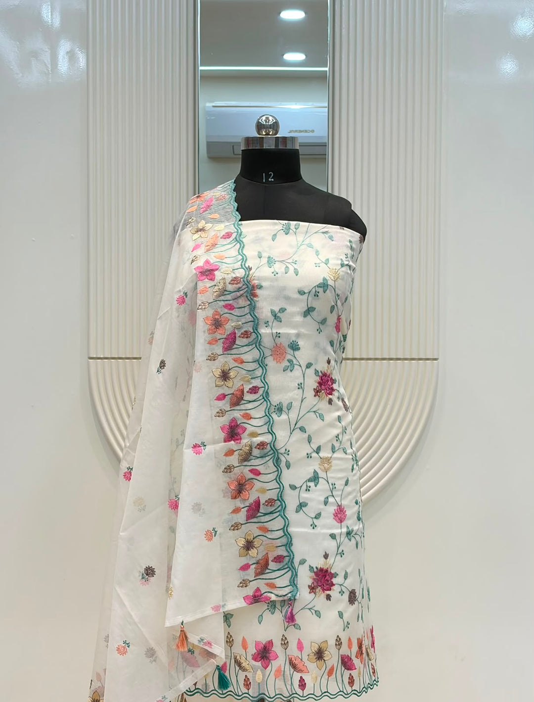 Pure Banarasi Mul Cotton Silk Embroidery Unstitched suit.