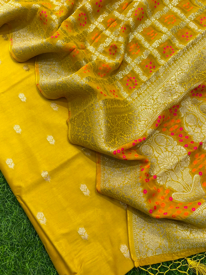 Pure Banarasi Chanderi Silk Buti Work Unstitched Suit With Banarasi Georgette Bandhani Heavy Dupatta.