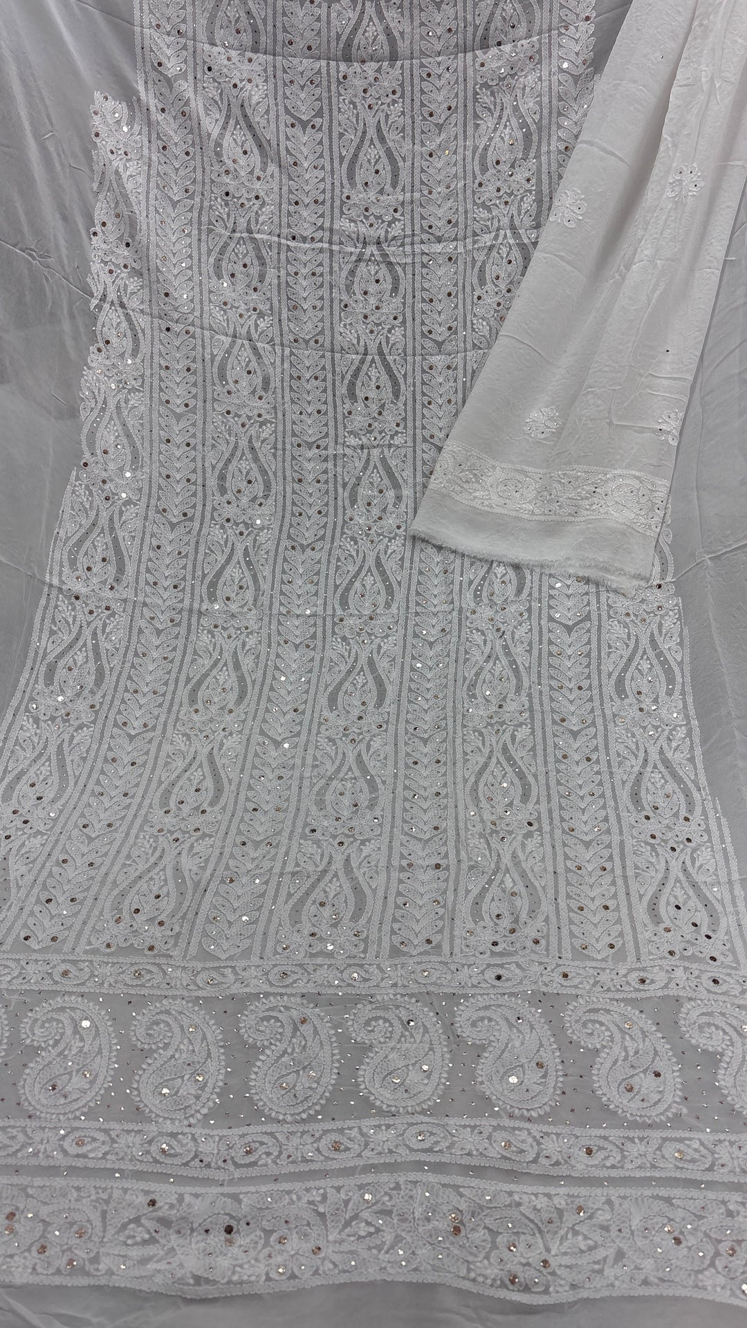 Pure Viscose Georgette Chikankari And Mukesh Work Unstitched Suit.