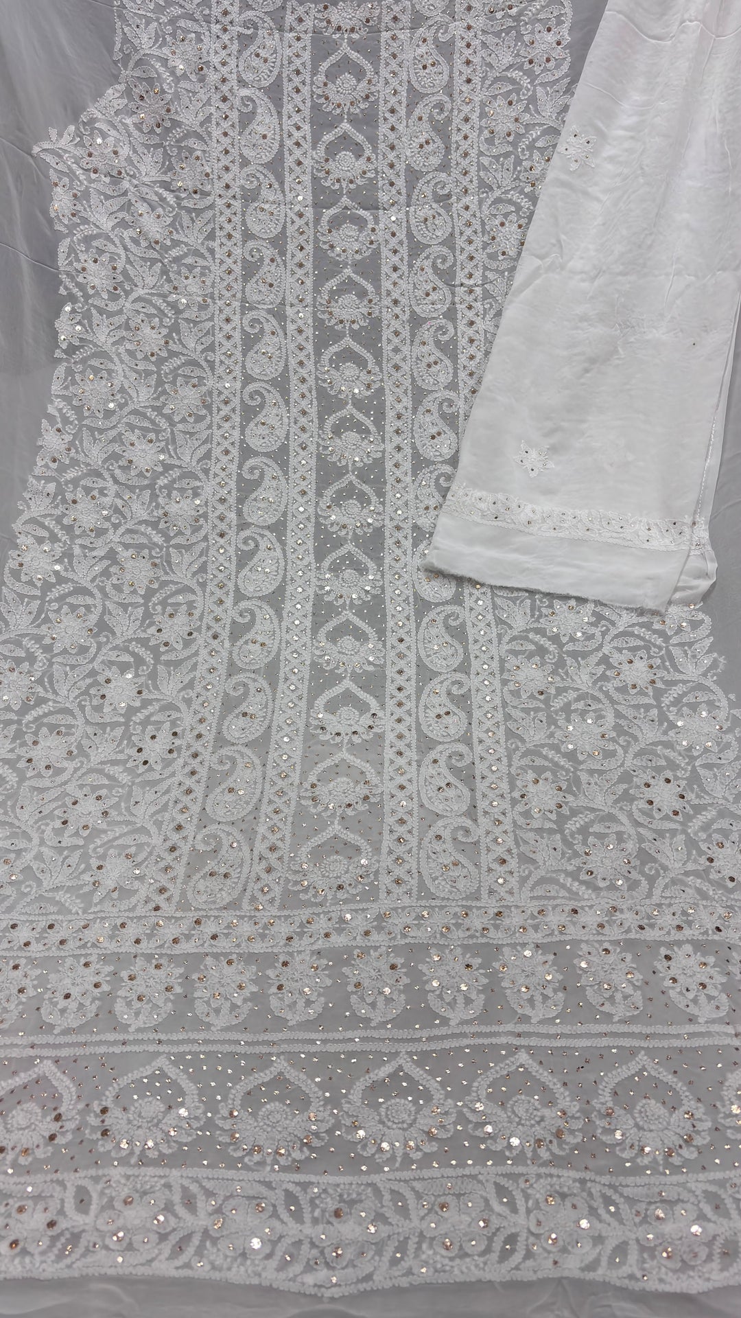 Pure Viscose Georgette Chikankari And Mukesh Work Unstitched Suit.