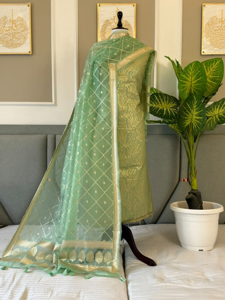 Banarasi Brocade Unstitched Suit With Organza Lorex Zari Weaved Dupatta.