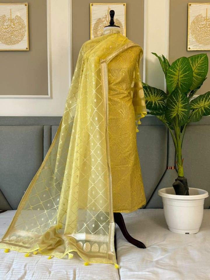 Banarasi Brocade Unstitched Suit With Organza Lorex Zari Weaved Dupatta.