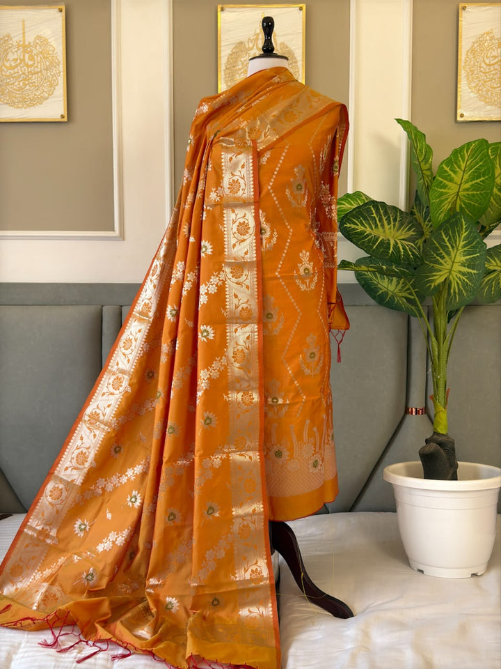 Banarasi Soft Silk Unstitched Suit With Zari Work Dupatta.