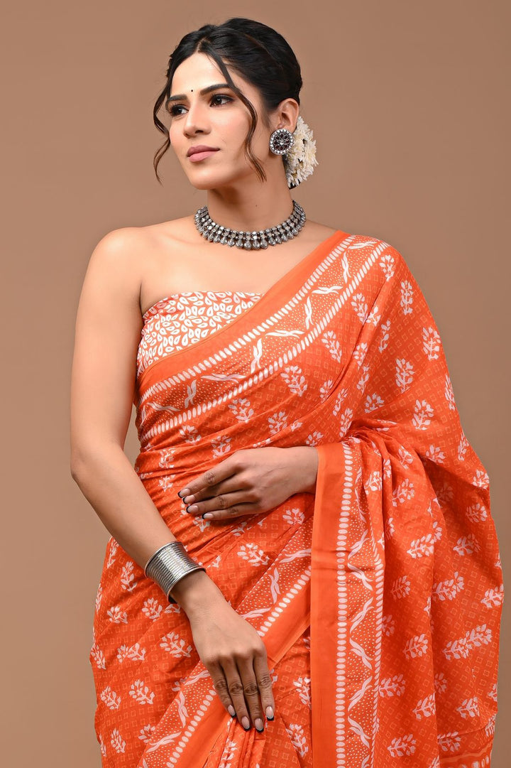 Pure  Mul cotton Hand print saree with Blouse.