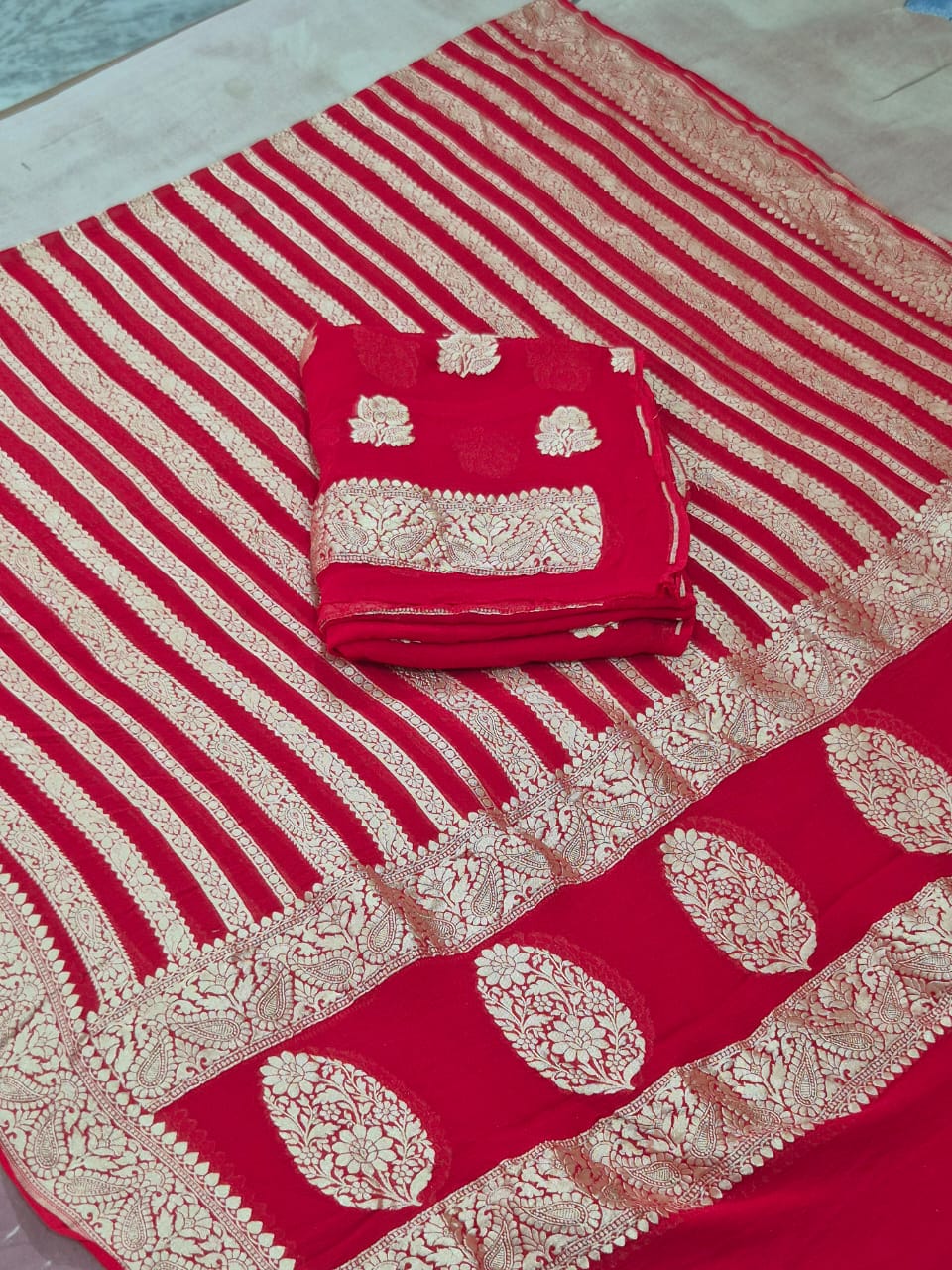 Pure Khaddi Chiffon Unstitched Suit With Zari Work.