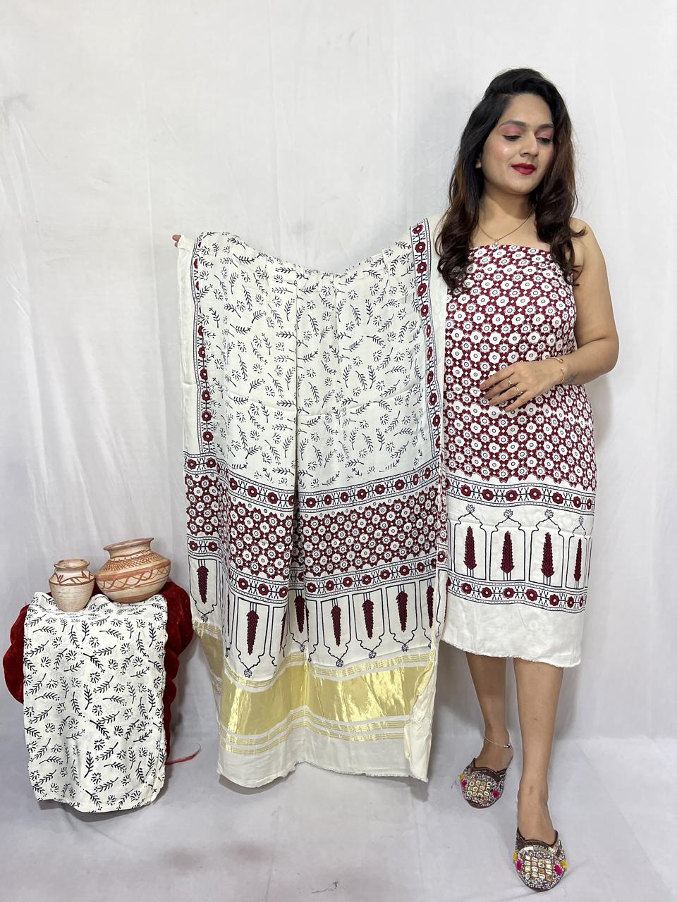 Pure Modal Silk Ajrakh Hend Block Zari Pallu Weaved 3pc Unstitched Suit .