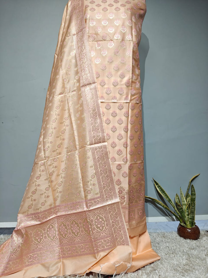 Pure Banarasi Silk Zari weaved unstitched suit with dupatta.