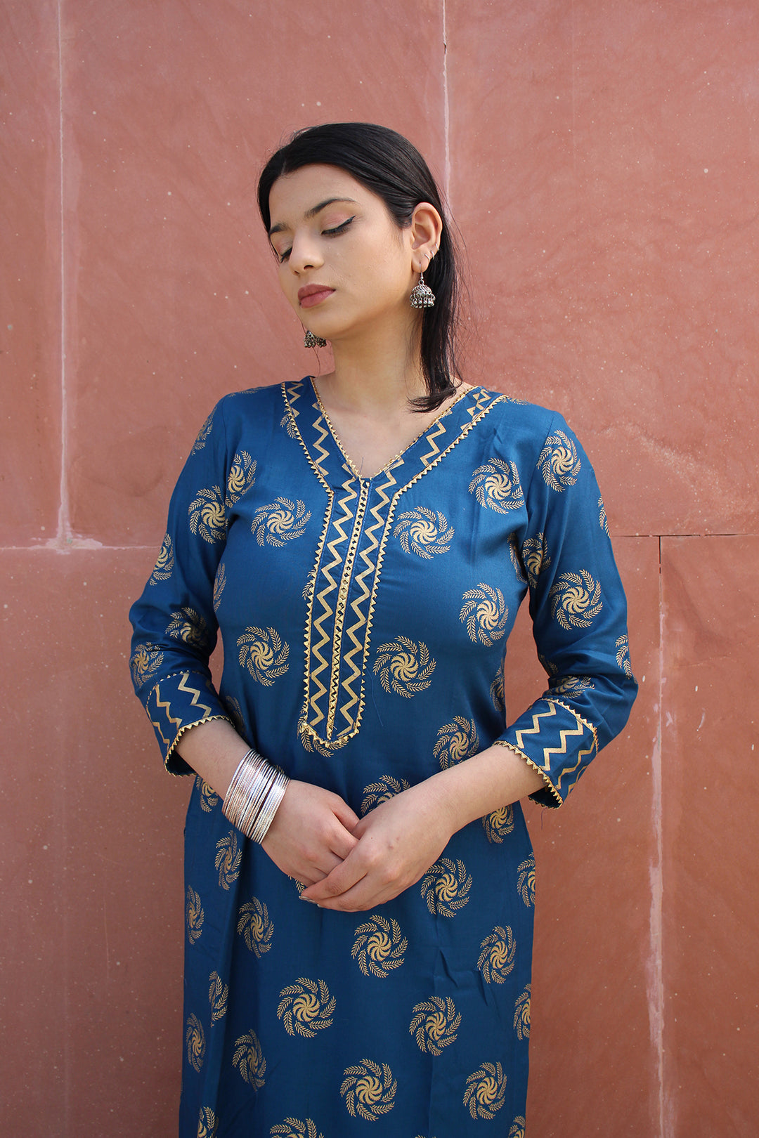 Kurta & Palazzo Set in Rayon Material with Metallic Print Golden Lace On Neck and Sleeves.
